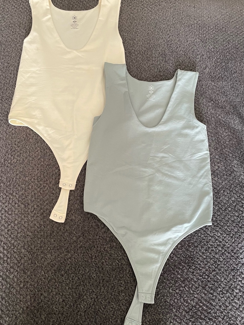 Aura Sleeveless Scoop Bodysuits in pale yellow and Light blue/sage